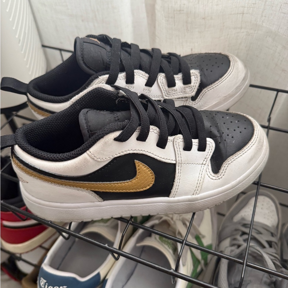 Nike Jordan Low-Top Sneakers in Black, White & Gold Accent